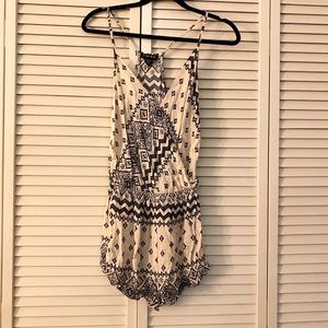 White romper with black design